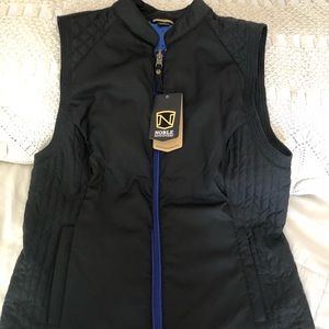 Black and blue polka dot reversible riding vest